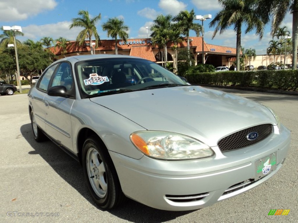 Silver Frost Metallic Ford Taurus