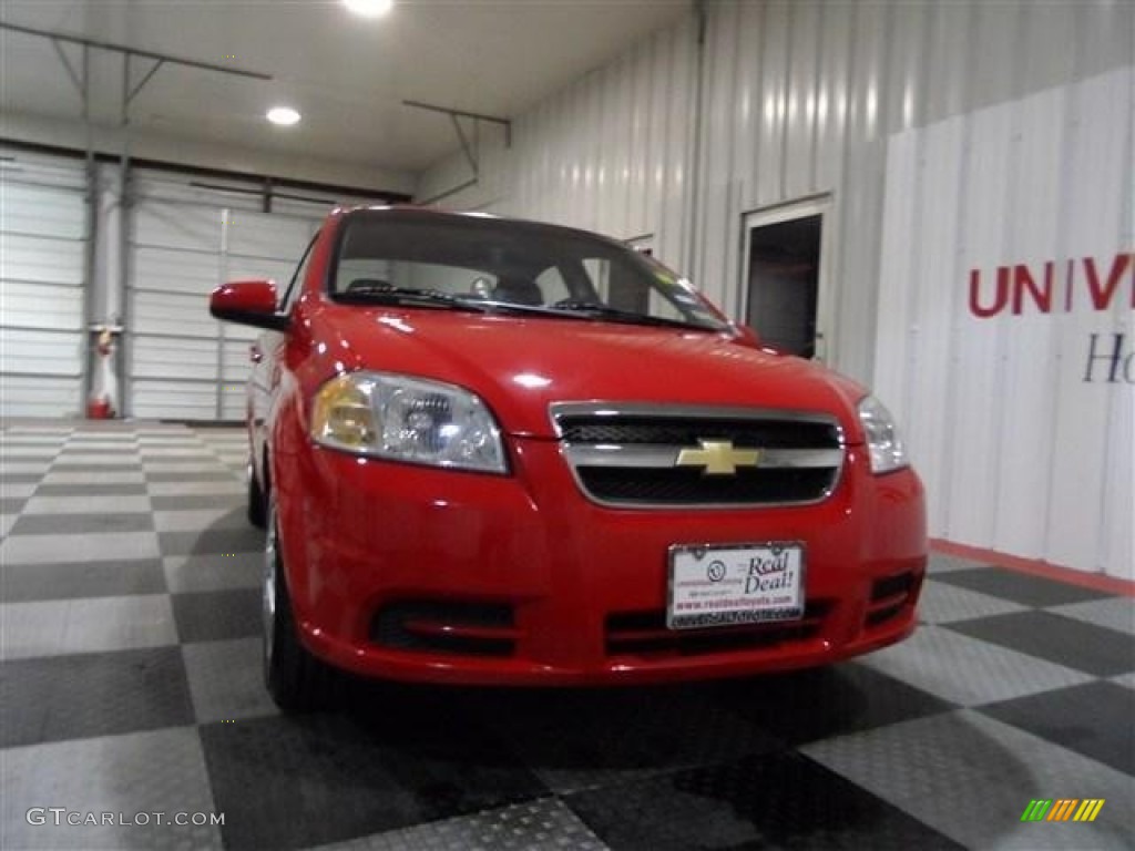 2010 Aveo LS Sedan - Victory Red / Charcoal photo #2