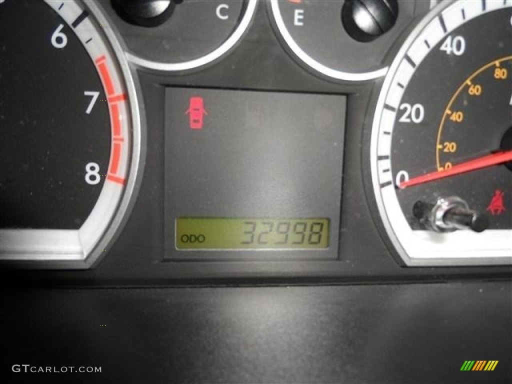 2010 Aveo LS Sedan - Victory Red / Charcoal photo #12