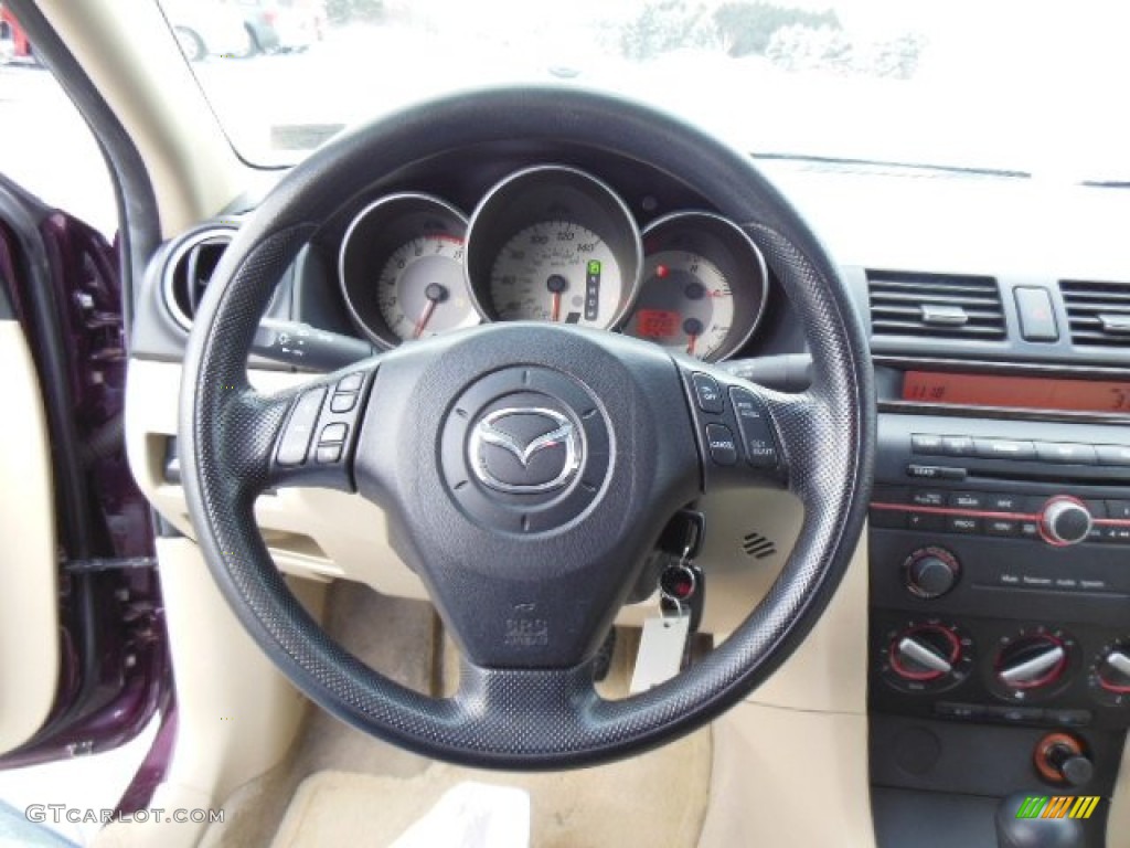 2007 Mazda MAZDA3 i Sport Sedan Beige Steering Wheel Photo #75240746