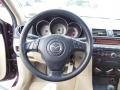 Beige 2007 Mazda MAZDA3 i Sport Sedan Steering Wheel