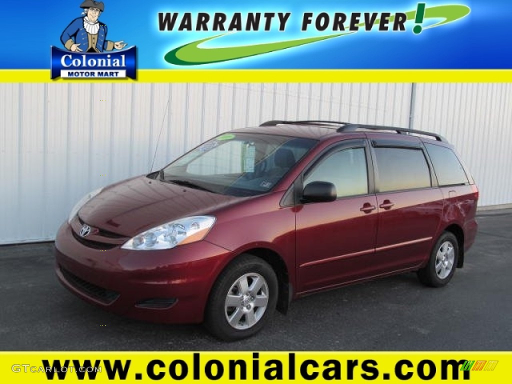 2010 Sienna LE - Salsa Red Pearl / Taupe photo #1