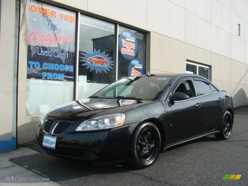 2009 G6 Sedan - Carbon Black Metallic / Ebony photo #1