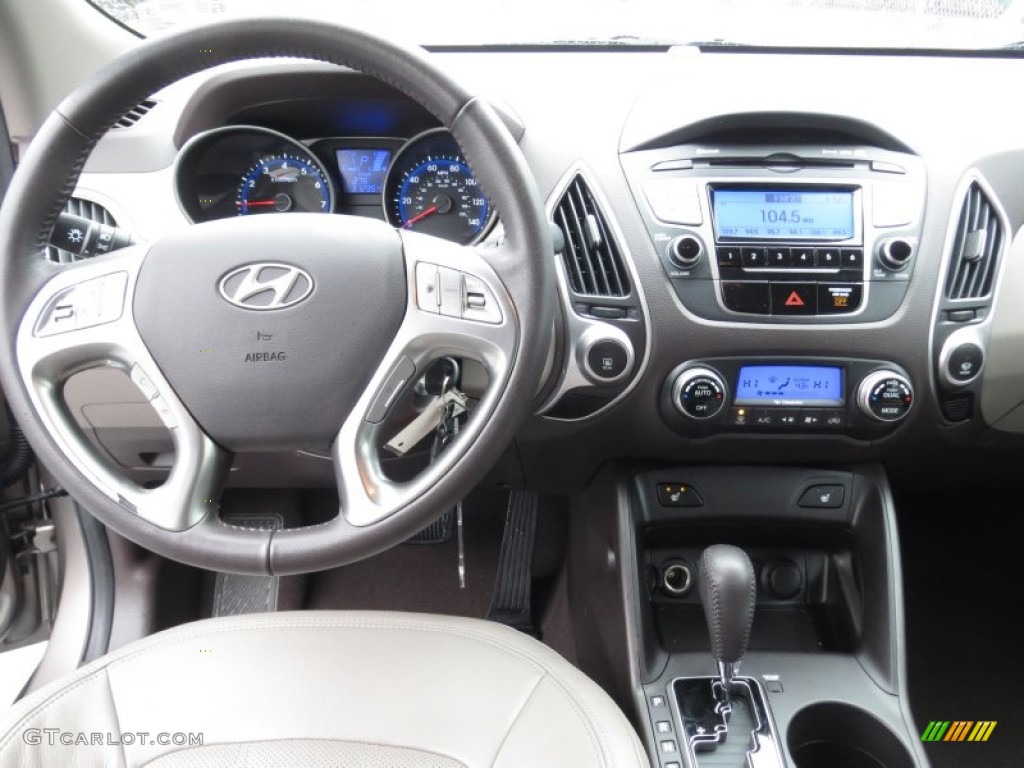 2011 Hyundai Tucson Limited Taupe Dashboard Photo #75371894