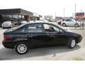 2006 Pitch Black Ford Focus ZX4 SE Sedan  photo #4