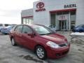 2009 Red Brick Nissan Versa 1.8 S Sedan  photo #1