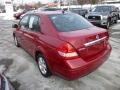 2009 Red Brick Nissan Versa 1.8 S Sedan  photo #5