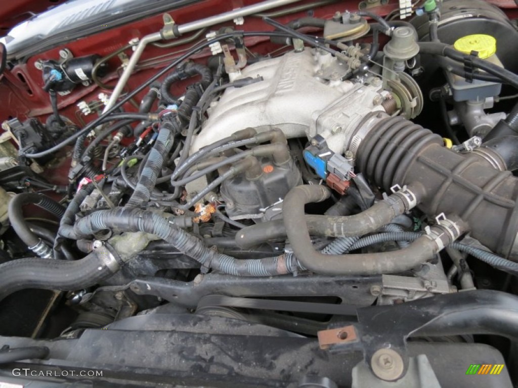 2004 Xterra XE - Thermal Red Metallic / Gray photo #14