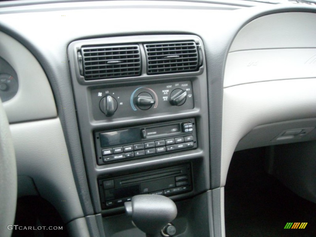 1999 Mustang V6 Coupe - Electric Green Metallic / Light Graphite photo #18