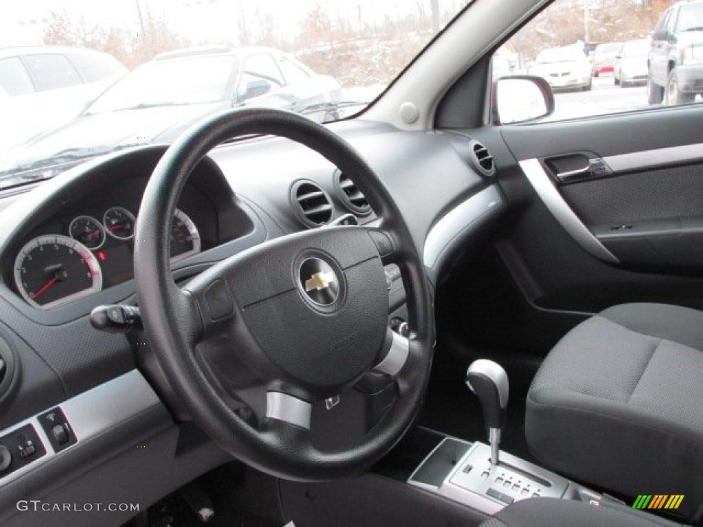 2011 Chevrolet Aveo LT Sedan Charcoal Steering Wheel Photo #75459600
