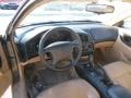 1999 Dodge Avenger Black/Tan Interior Prime Interior Photo