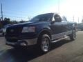 2005 True Blue Metallic Ford F150 XLT SuperCab 4x4  photo #1