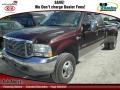 2004 Dark Toreador Red Metallic Ford F350 Super Duty King Ranch Crew Cab 4x4 Dually  photo #1