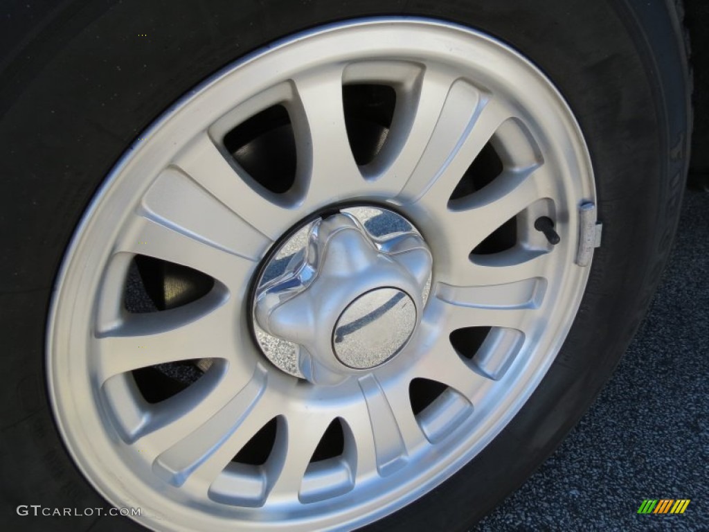 2003 Ford F150 XLT SuperCab Wheel Photo #75573694