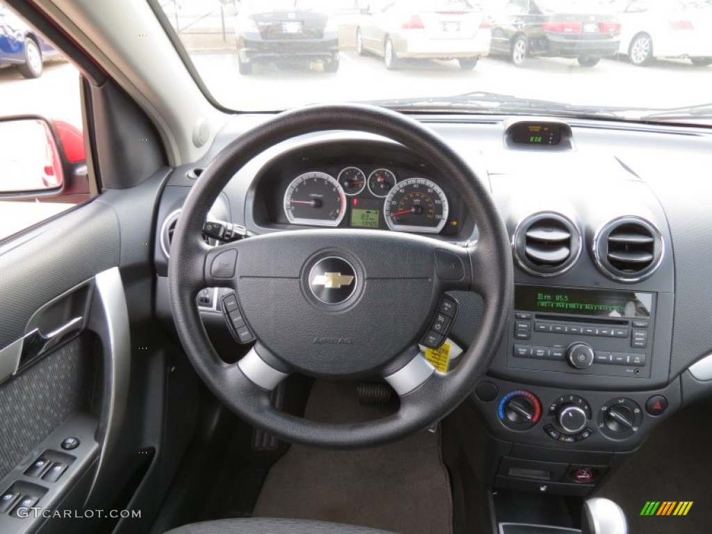 2009 Chevrolet Aveo LT Sedan Charcoal Steering Wheel Photo #75672519