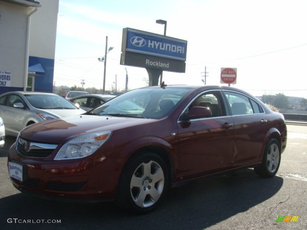 2009 Aura XE - Red Jewel Tintcoat / Tan photo #1