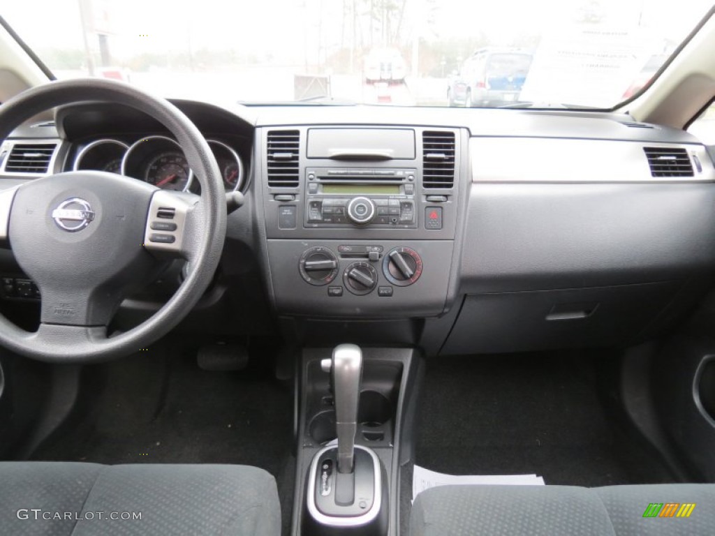 2011 Versa 1.8 S Sedan - Red Brick / Charcoal photo #11