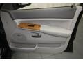 2009 Jeep Grand Cherokee Dark Slate Gray/Light Graystone Royale Leather Interior Door Panel Photo