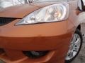 2010 Orange Revolution Metallic Honda Fit Sport  photo #8