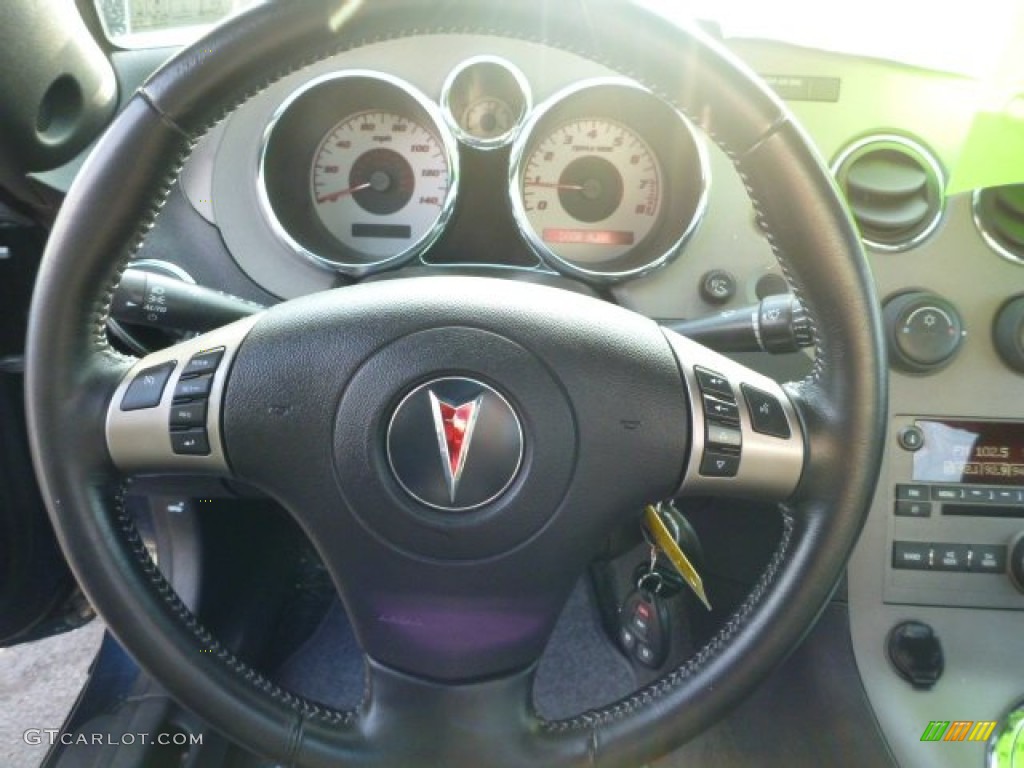 2007 Pontiac Solstice Roadster Ebony Steering Wheel Photo #75744539