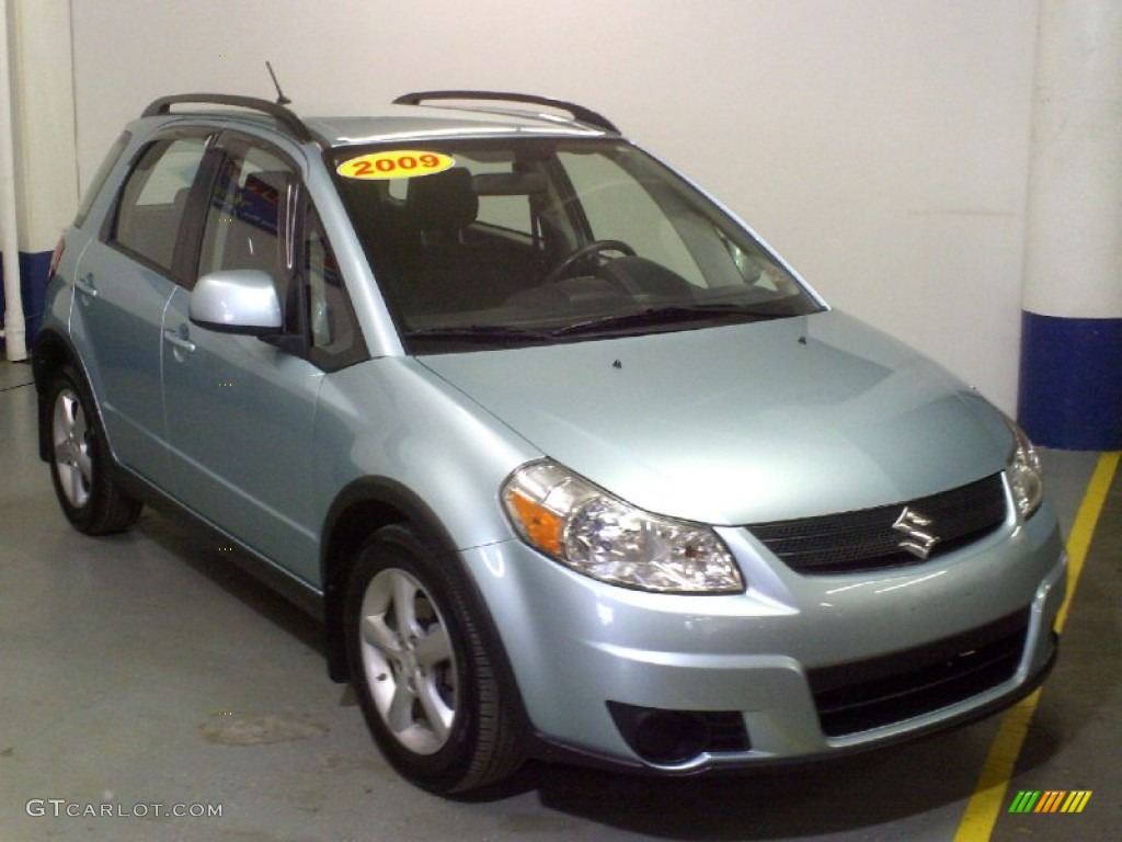 Vapor Blue Metallic 2009 Suzuki SX4 Crossover Technology AWD Exterior Photo #75752157