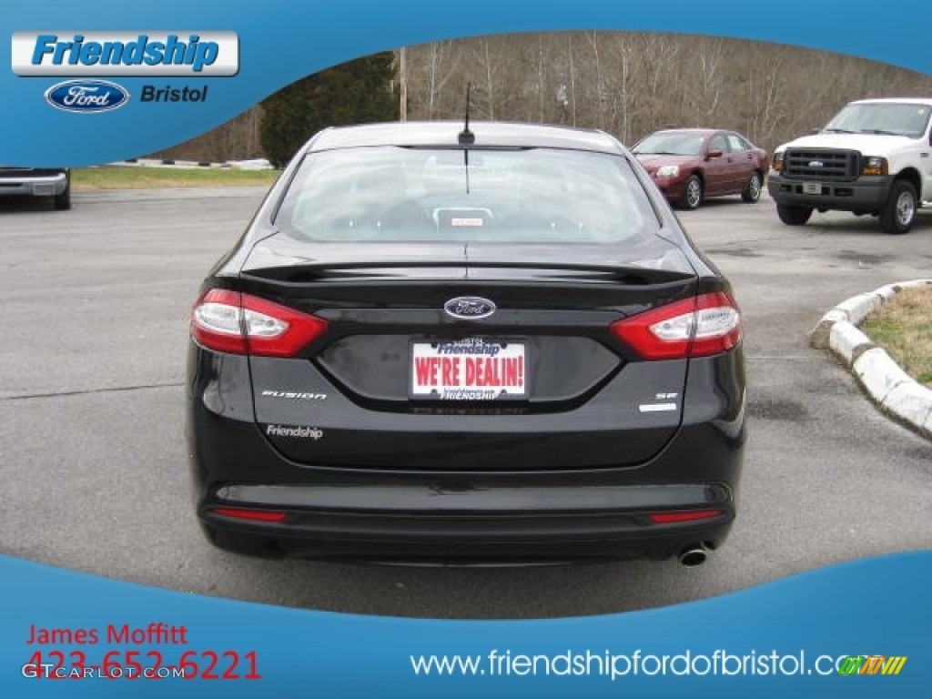 2013 Fusion SE 1.6 EcoBoost - Tuxedo Black Metallic / SE Appearance Package Charcoal Black/Red Stitching photo #7