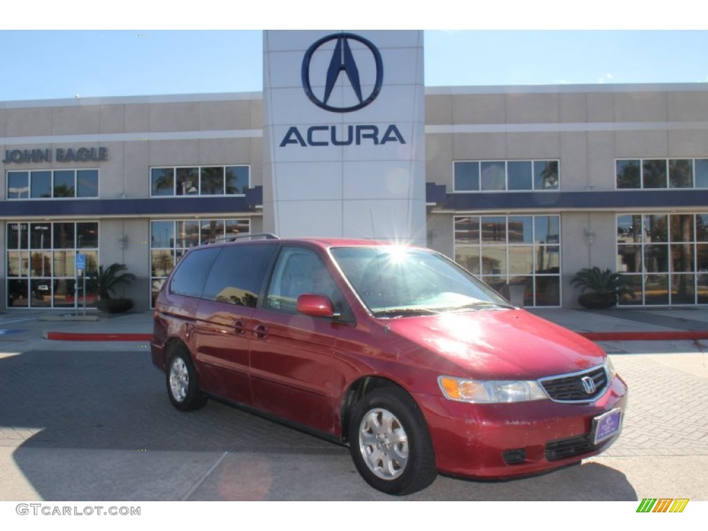 Red Rock Pearl Honda Odyssey