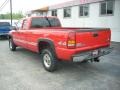 2002 Fire Red GMC Sierra 2500HD SLE Extended Cab  photo #11