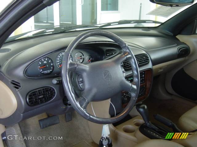 1999 Sebring JXi Convertible - Bright White / Camel Beige photo #12