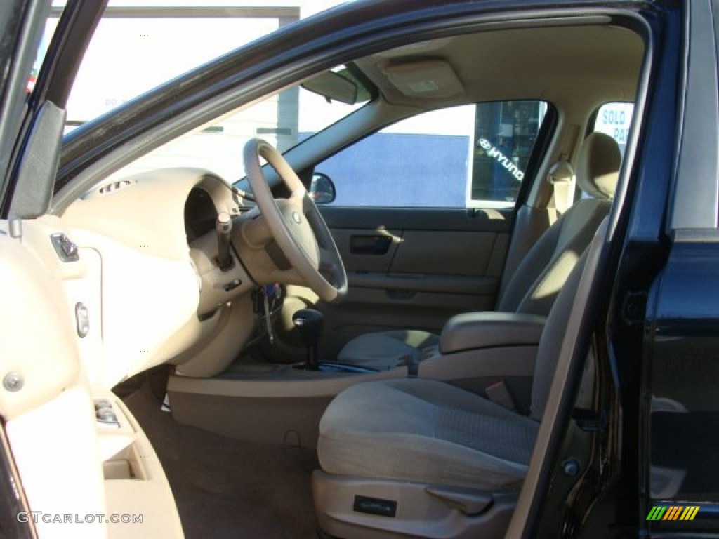 2004 Taurus SE Sedan - Black / Medium Parchment photo #9