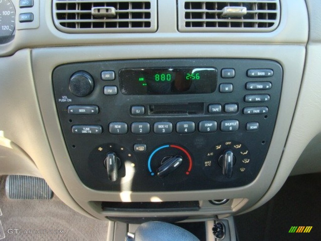 2004 Taurus SE Sedan - Black / Medium Parchment photo #14