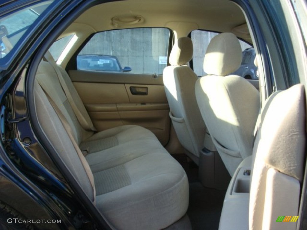 2004 Taurus SE Sedan - Black / Medium Parchment photo #19