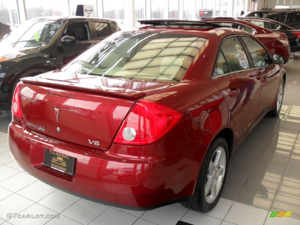 2009 G6 V6 Sedan - Performance Red Metallic / Ebony photo #2