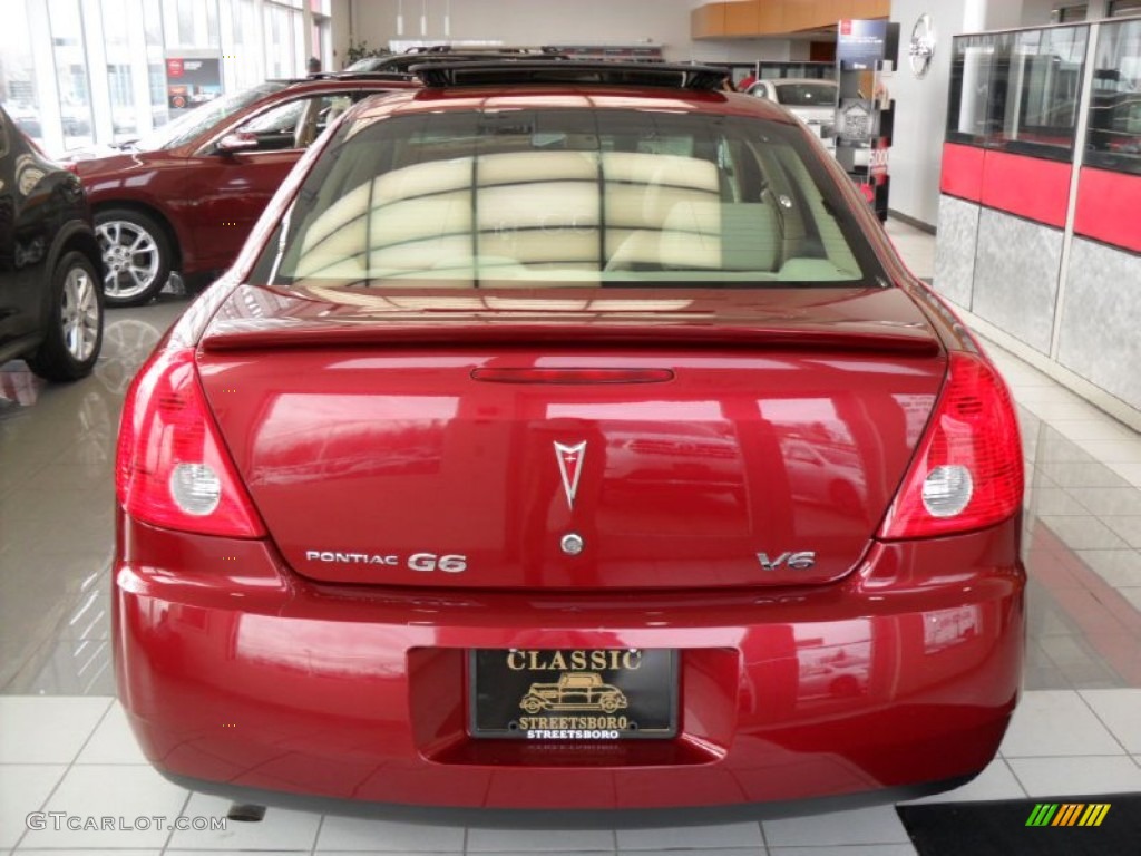 2009 G6 V6 Sedan - Performance Red Metallic / Ebony photo #4