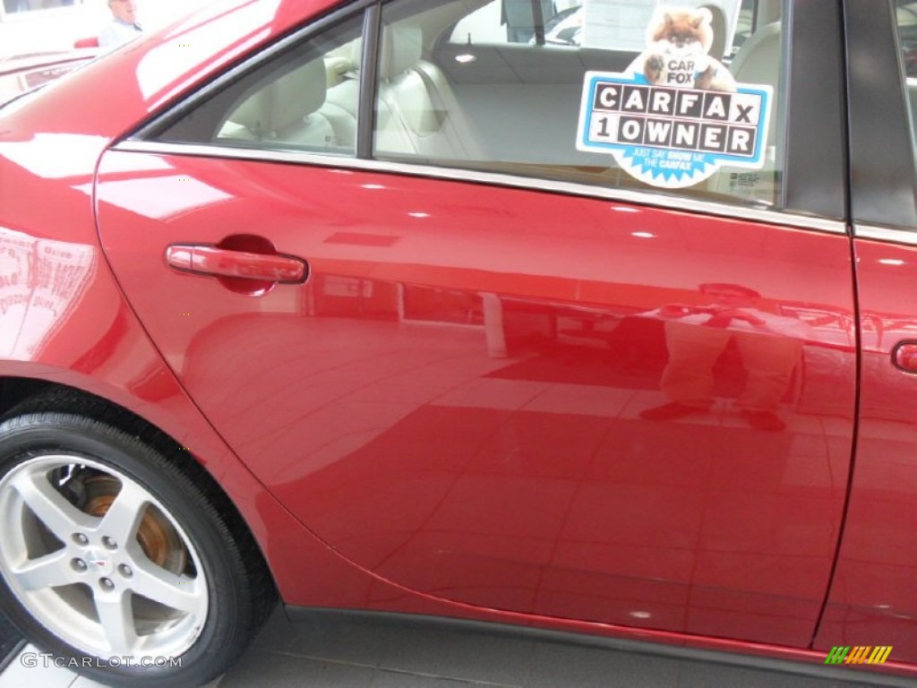 2009 G6 V6 Sedan - Performance Red Metallic / Ebony photo #7