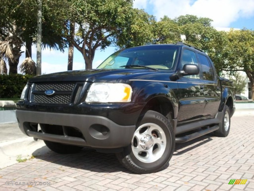 2005 Explorer Sport Trac XLS - Black Clearcoat / Medium Pebble photo #1