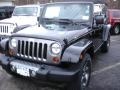 Black 2013 Jeep Wrangler Unlimited Oscar Mike Freedom Edition 4x4