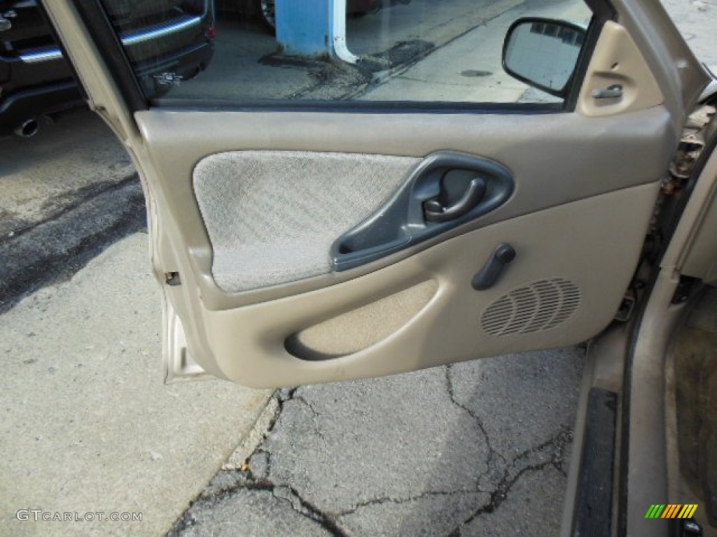 1997 Chevrolet Cavalier Sedan Neutral Door Panel Photo #75891644