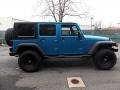 2010 Surf Blue Pearl Jeep Wrangler Unlimited Sport 4x4  photo #7