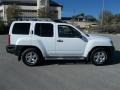 2010 Avalanche White Nissan Xterra SE  photo #3