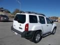 2010 Avalanche White Nissan Xterra SE  photo #4