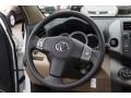 Sand Beige 2011 Toyota RAV4 I4 4WD Steering Wheel