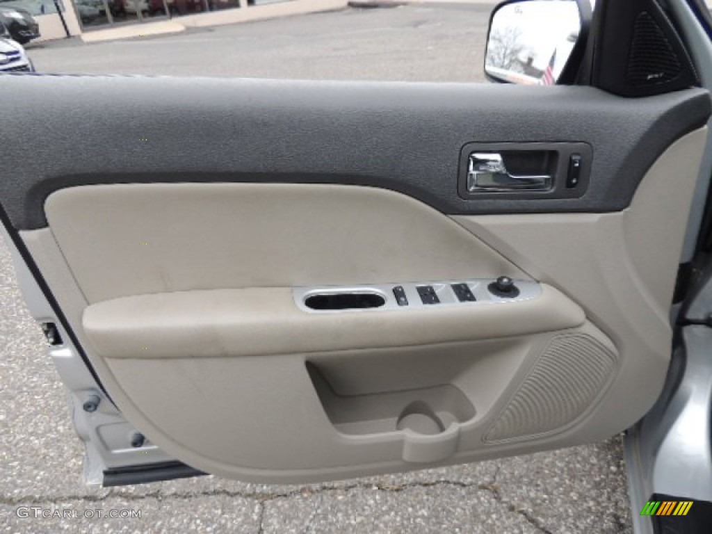 2010 Mercury Milan V6 Premier Dark Charcoal/Medium Light Stone Door Panel Photo #75983056