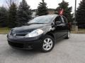 Super Black - Versa 1.8 S Hatchback Photo No. 1