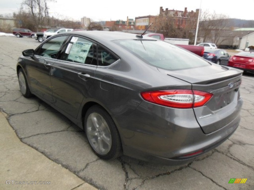 2013 Fusion SE 1.6 EcoBoost - Sterling Gray Metallic / SE Appearance Package Charcoal Black/Red Stitching photo #6