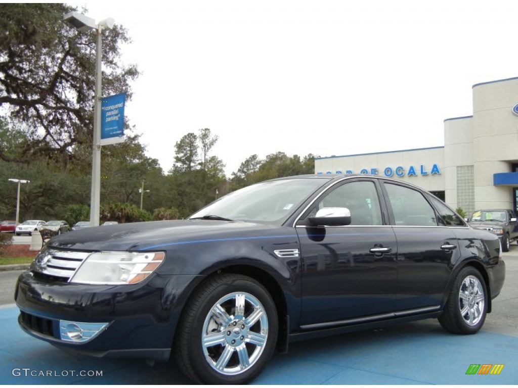 Dark Ink Blue Metallic Ford Taurus