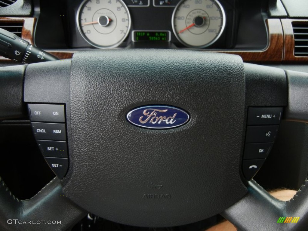 2009 Taurus Limited - Dark Ink Blue Metallic / Black photo #25