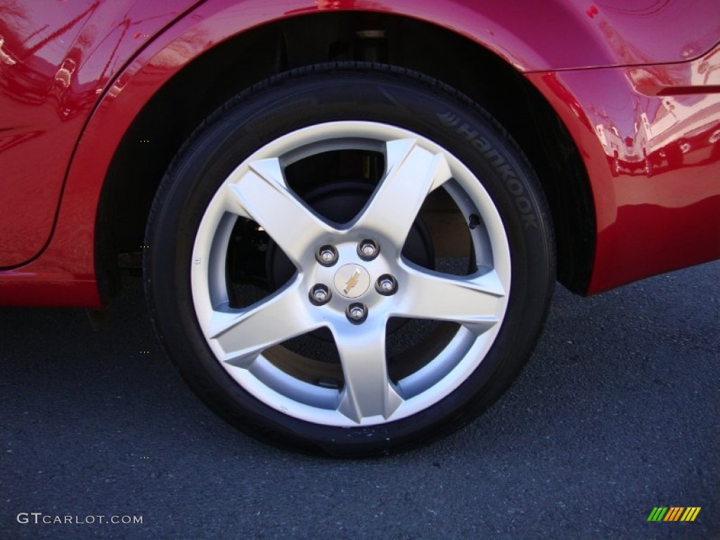 2012 Sonic LTZ Sedan - Crystal Red Tintcoat / Jet Black/Dark Titanium photo #24