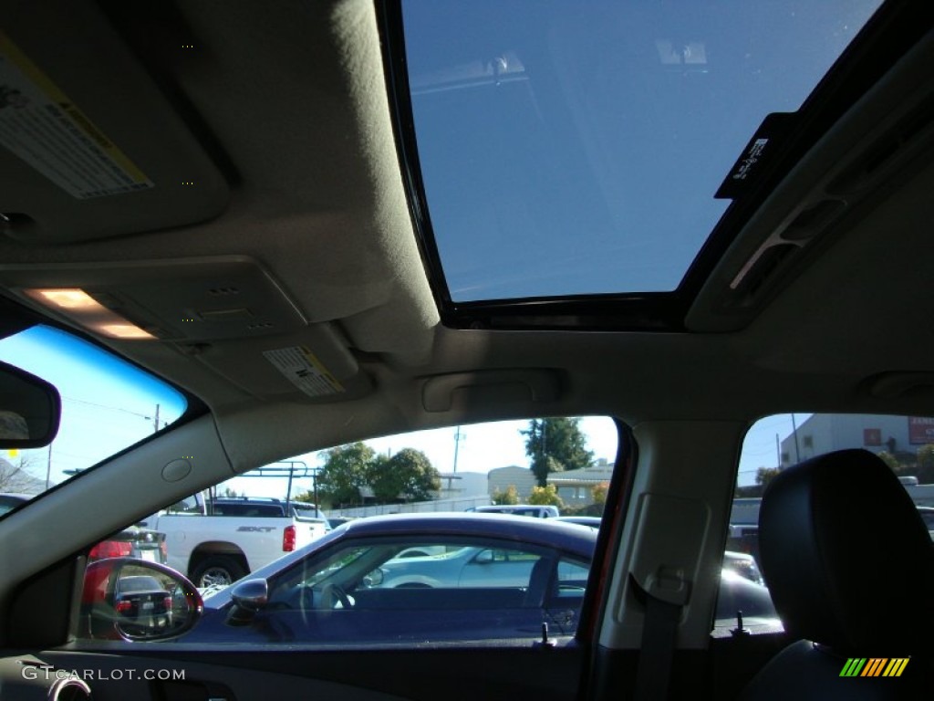 2012 Sonic LTZ Sedan - Crystal Red Tintcoat / Jet Black/Dark Titanium photo #26