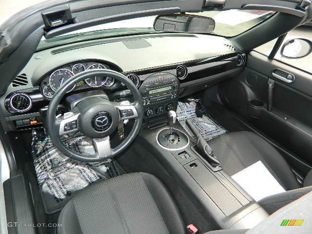 Black Interior 2006 Mazda MX-5 Miata Touring Roadster Photo #76147811